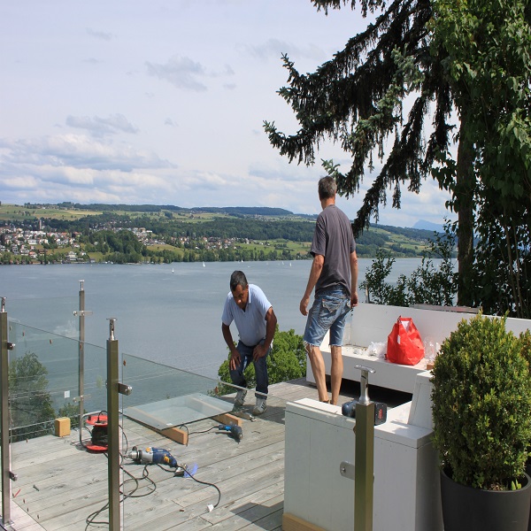 Square post glass railing project in Switzerland